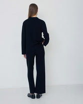 Giacca in maglia nera con bottoni